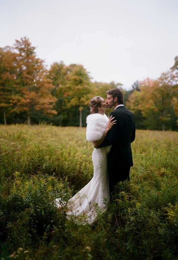 Rustic Glam Couple Portrait in Field with Bridal Fur Stole