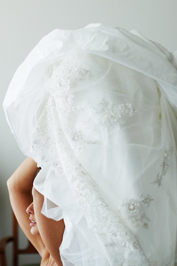 bride putting wedding dress on, photo by Chile based wedding photographer Kyle Hepp | junebugweddings.com bride putting wedding dress on, photo by Chile based wedding photographer Kyle Hepp | junebugweddings.com