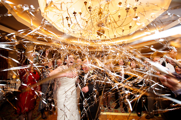 guests toss silver streamers at bride and groom as they depart - Gorgeous wedding reception photo by Atlanta-based Scott Hopkins | Junebug Weddings guests toss silver streamers at bride and groom as they depart - Gorgeous wedding reception photo by Atlanta-based Scott Hopkins | Junebug Weddings