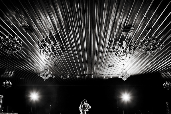 stunning photo of bride and groom dancing by Austin-based Caroline + Ben | Junebug Weddings stunning photo of bride and groom dancing by Austin-based Caroline + Ben | Junebug Weddings