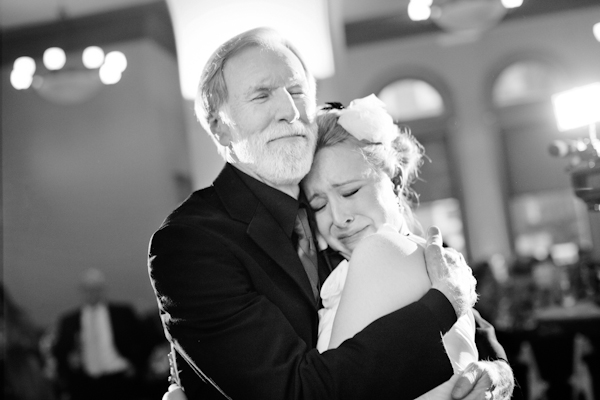 Touching moment as father and bride hug - Emotional wedding reception photo by Dallas-based Helmut Lang Photography | Junebug Weddings Touching moment as father and bride hug - Emotional wedding reception photo by Dallas-based Helmut Lang Photography | Junebug Weddings