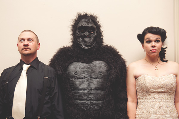 hilarious portrait of bride and groom posing with gorilla - photo by top Dallas-based wedding photographers Nine Photography hilarious portrait of bride and groom posing with gorilla - photo by top Dallas-based wedding photographers Nine Photography