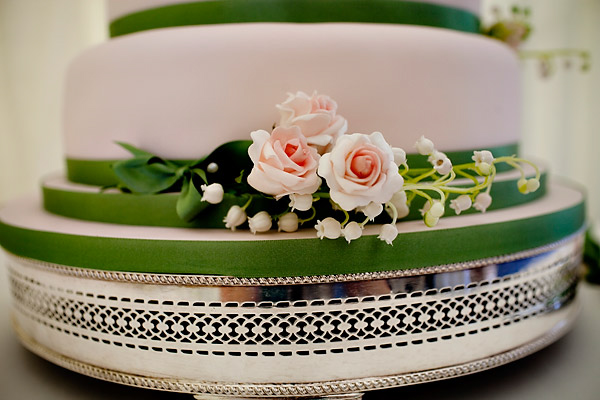 The cake with green and pick decorations- Jane Austen inspired UK wedding in Chippenham Park - photos by top North Carolina wedding photographer Tracy Turpen Jane Austen inspired UK wedding in Chippenham Park - photos by top North Carolina wedding photographer Tracy Turpen