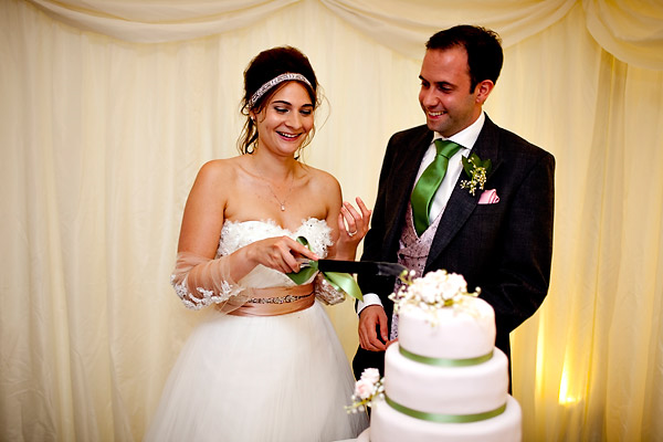 The bride and groom cutting the cake- Jane Austen inspired UK wedding in Chippenham Park - photos by top North Carolina wedding photographer Tracy Turpen Jane Austen inspired UK wedding in Chippenham Park - photos by top North Carolina wedding photographer Tracy Turpen