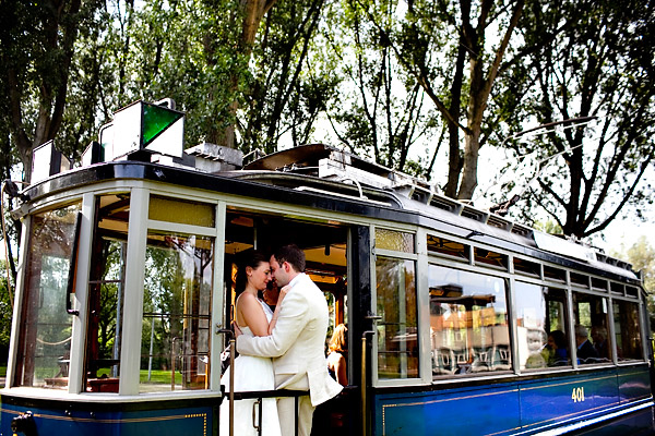 Portrait of the bride and groom in the doorway of the trolley- Amsterdam trolley wedding on Electrische Museumtram - photos by top North Carolina wedding photographer Tracy Turpen Amsterdam trolley wedding on Electrische Museumtram - photos by top North Carolina wedding photographer Tracy Turpen