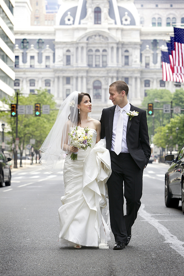 bride and groom walking down street in downtown Philadelphia - photo by top Philadelphia photographers Langdon Photography bride and groom walking down street in downtown Philadelphia - photo by top Philadelphia photographers Langdon Photography