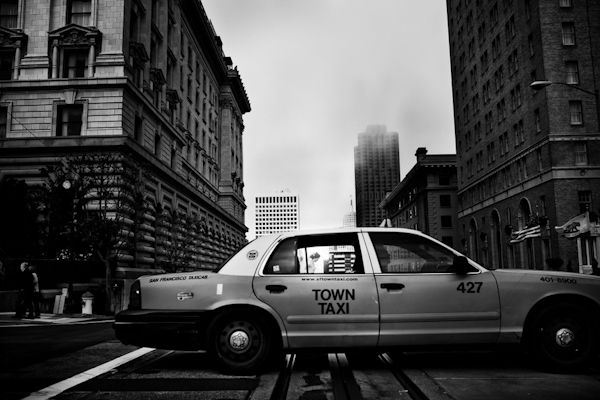 black and white photo of bride through window of New York City taxi - creative wedding photo by Chrisman Studios black and white photo of bride through window of New York City taxi - creative wedding photo by Chrisman Studios