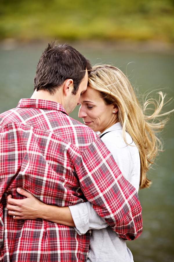 Couple kiss in front of the beautiful scenery- Breckenridge, Colorado engagement session in the snow, photos by Jason + Gina Wedding Photographers Breckenridge, Colorado engagement session in the snow, photos by Jason + Gina Wedding Photographers