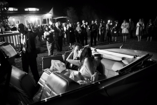 gorgeous black and white photo of the happy couple in convertible after grand wedding exit - photo by top photographers Holland Photo Arts gorgeous black and white photo of the happy couple in convertible after grand wedding exit - photo by top photographers Holland Photo Arts