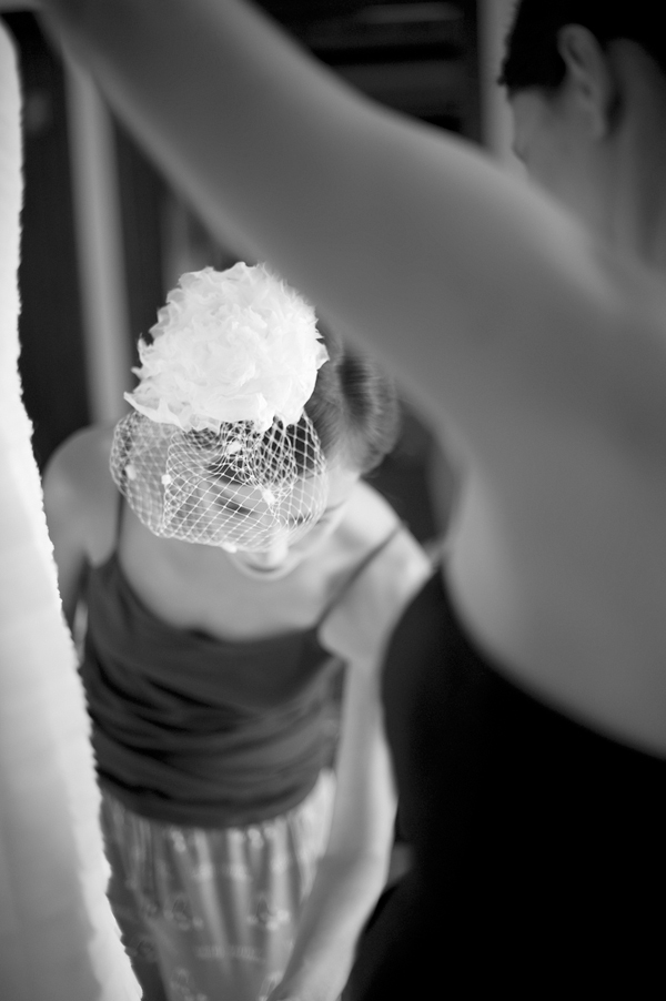 Bride getting help with her dress- New England wedding - Bar Harbor Sorrento, Maine - photos by top east coast wedding photographers Justin and Mary New England wedding - Bar Harbor Sorrento, Maine - photos by top east coast wedding photographers Justin and Mary