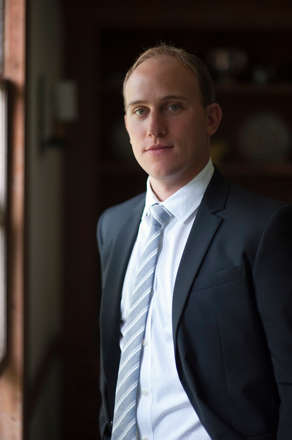 Window lit portrait of the groom- New England wedding - Bar Harbor Sorrento, Maine - photos by top east coast wedding photographers Justin and Mary New England wedding - Bar Harbor Sorrento, Maine - photos by top east coast wedding photographers Justin and Mary