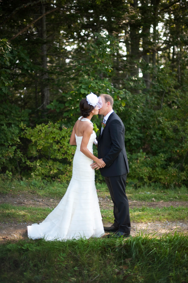 The bride and groom kiss in the garden-- New England wedding - Bar Harbor Sorrento, Maine - photos by top east coast wedding photographers Justin and Mary New England wedding - Bar Harbor Sorrento, Maine - photos by top east coast wedding photographers Justin and Mary
