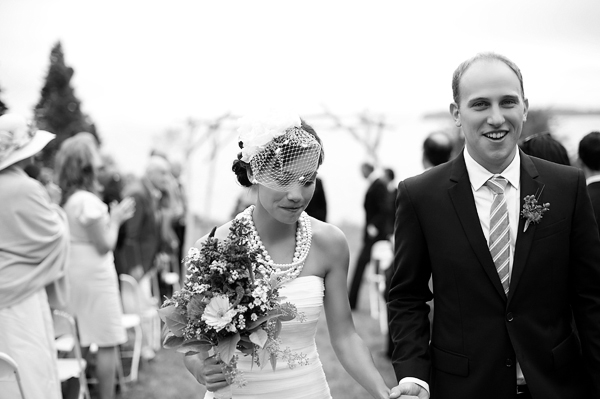 The bride and groom leaving the ceremony- New England wedding - Bar Harbor Sorrento, Maine - photos by top east coast wedding photographers Justin and Mary New England wedding - Bar Harbor Sorrento, Maine - photos by top east coast wedding photographers Justin and Mary