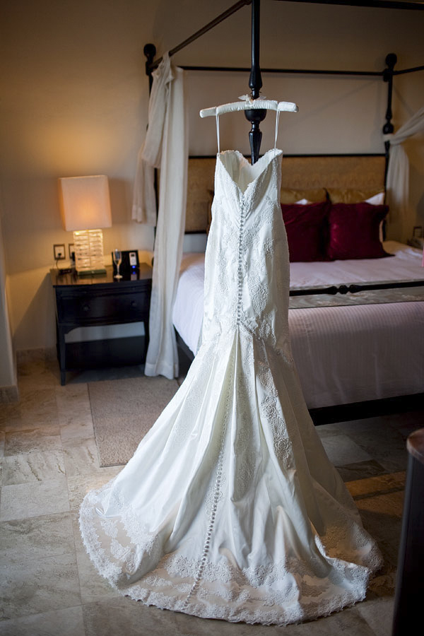 white wedding dress hanging - Secrets Resort - Riviera Maya, Mexico destination wedding - photo by Dallas based wedding photographer Jeremy Gilliam