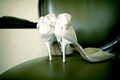 Image by Mel Barlow Photography, bow backed white wedding shoes