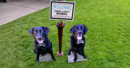 Life-sized dog cutouts, as greeters at a wedding! | Junebug Weddings