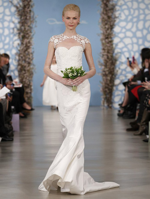 Wedding dress by Oscar de la Renta from his Spring 2014 bridal collection | via junebugweddings.com Wedding dress by Oscar de la Renta from his Spring 2014 bridal collection | via junebugweddings.com