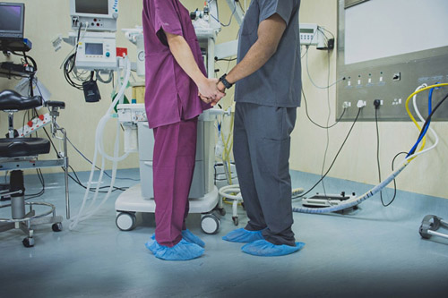 Doctor's engagement photos in an operating room, by Jacki Bruniquel | junebugweddings.com Doctor's engagement photos in an operating room, by Jacki Bruniquel | junebugweddings.com