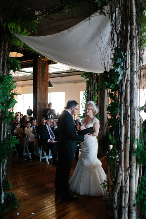 industrial wedding at The Liberty Warehouse, Brooklyn, NY with woodland decor - Elizabeth Duncan Events and Gulnara Studios | via junebugweddings.com