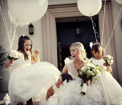 Laughing flower girls and bride, image by Boutwell Studio