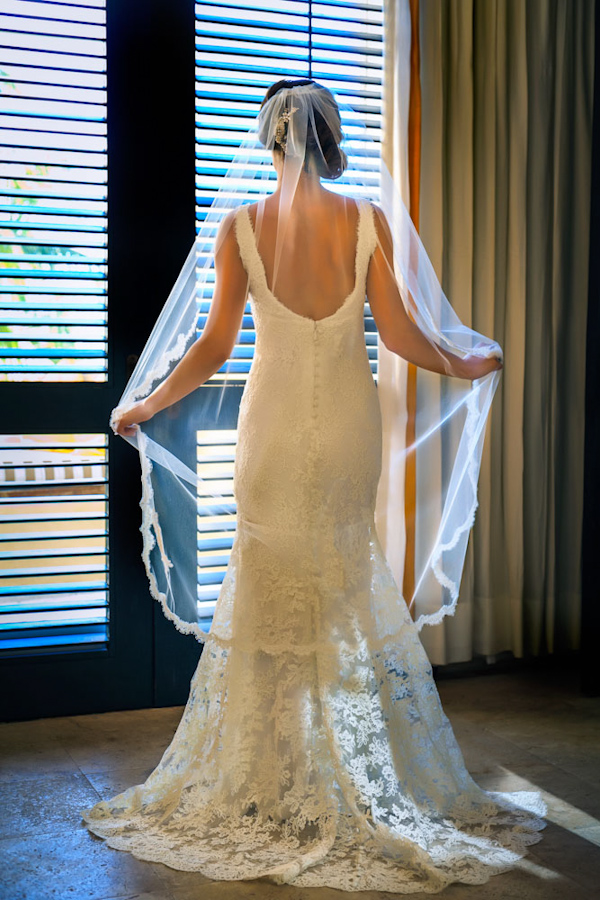 bridal gown and veil, photo by Zasil Studio | via junebugweddings.com