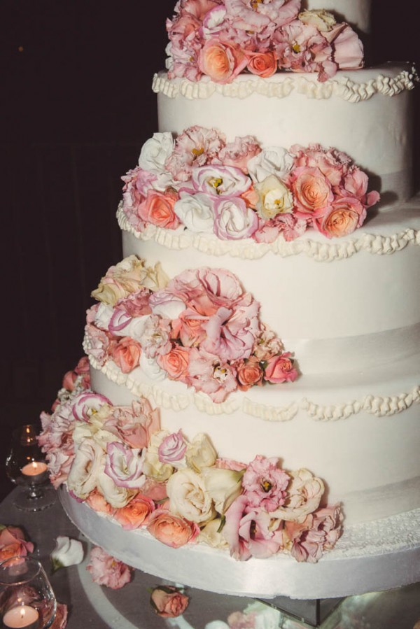 coral and pink roses wedding cake
