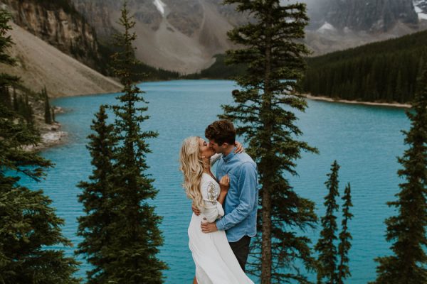 a-sudden-storm-only-made-this-lake-louise-engagement-more-stunning-nathan-walker-photography