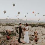 Unique Elopement Alert: This Couple Exchanged Vows Among Over 100 Hot Air Balloons in Cappadocia, Turkey