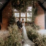 This Unique Giraffe Shed Wedding Was Dripping With Florals