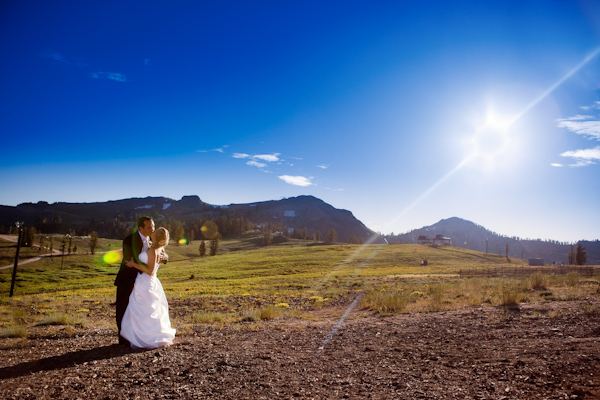 bride and groom in outdoor landscape wedding photo by Catherine Hall ...