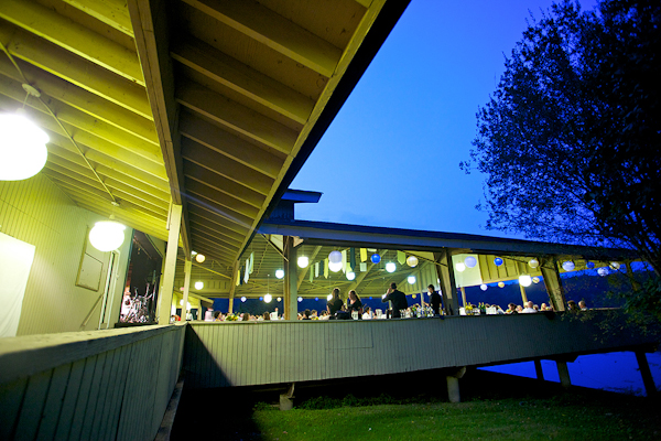 Waterfront Reception Venue With Hanging Lanterns Wedding Photo