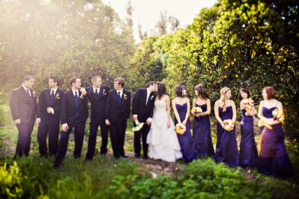 Outdoor Group Portrait Of Wedding Party Bridesmaids In Full