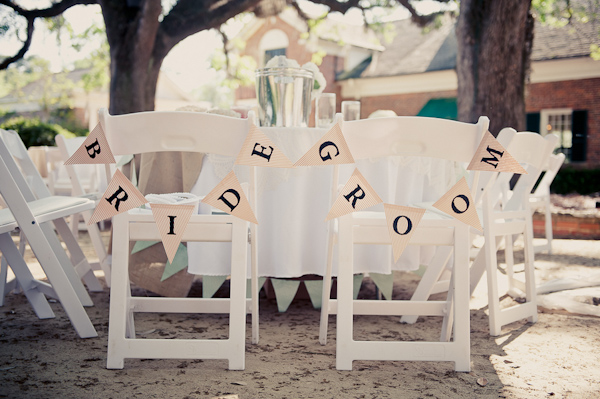 Bride and groom signs for a wedding reception seating arrangement - Wedding Photo by Elizabeth Davis