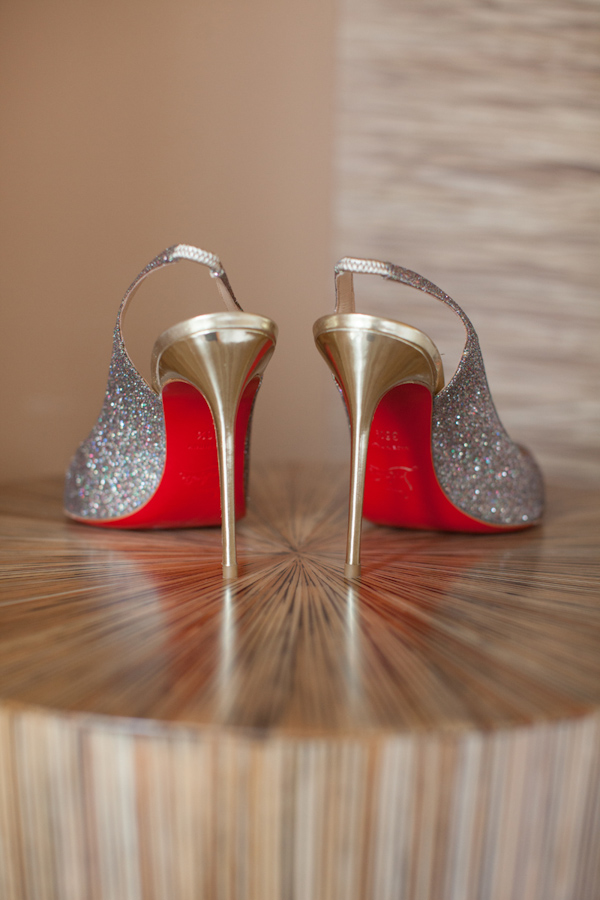 Wedding Photo by Miller and Miller Photography of silver and red shoes