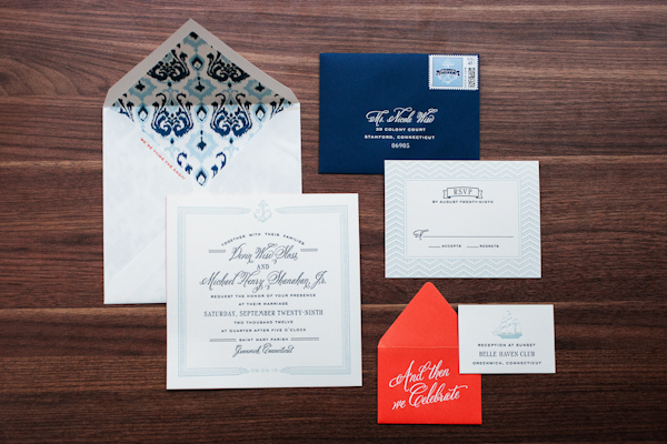 Nautical inspired wedding invitation in shades of navy, light blue and orange - Photo by Sarah Tew Photography