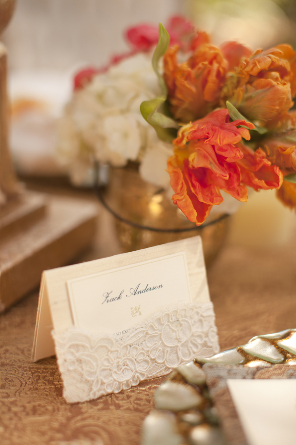orange flowers by champagne place card - wedding decor inspiration shoot - wedding invitation designed by Zenadia Designs