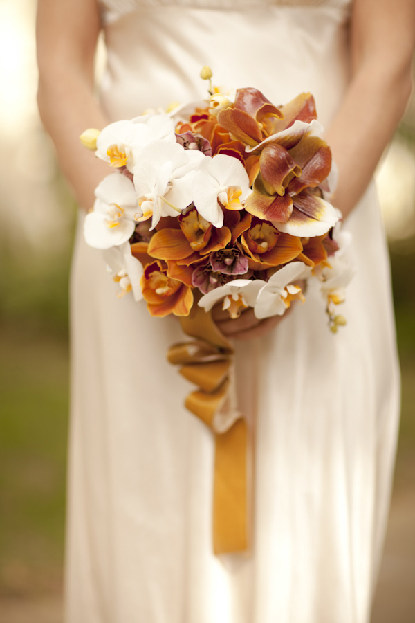 bride holds white and brown bouquet - wedding decor inspiration shoot - wedding invitation designed by Zenadia Designs