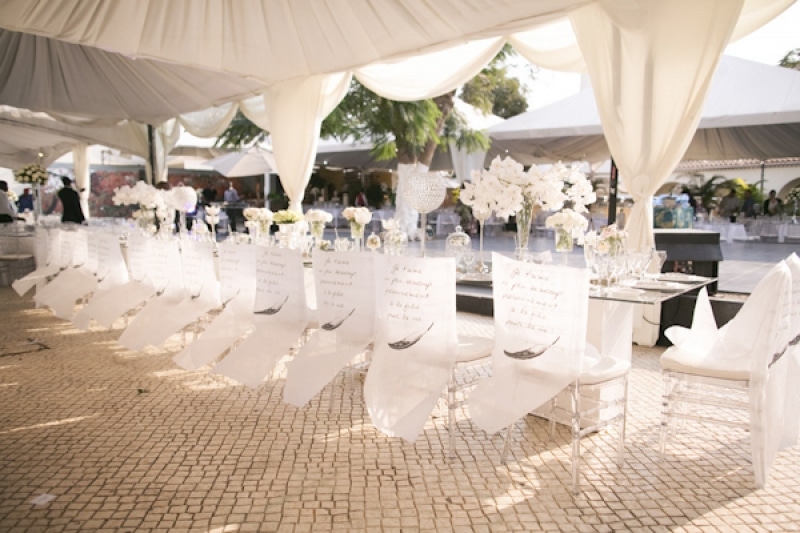 white tented reception seating, photo by Melissa Jill Photography