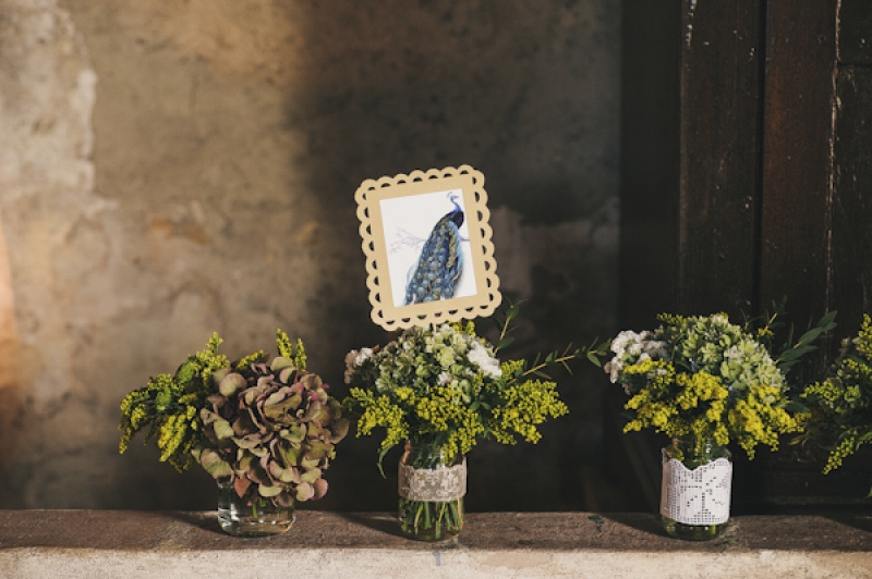 rustic floral centerpieces for destination wedding in Italy, photo by This Modern Love