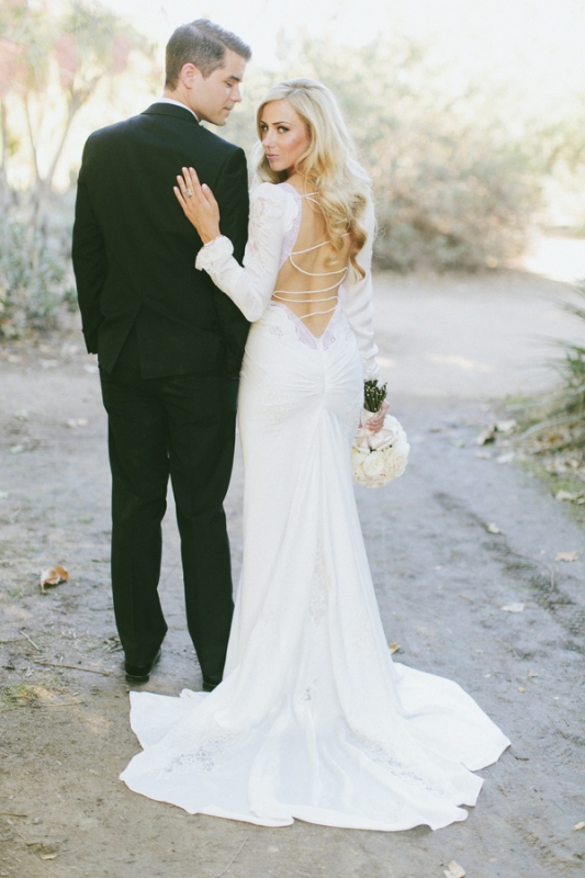 dramatic wedding dress with open back, photo by Wai Reyes Photography