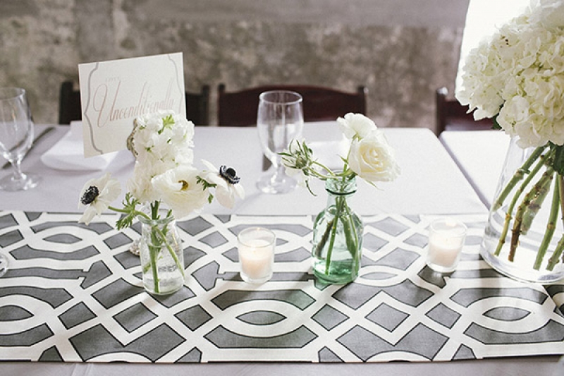 gray and white table top decor at wedding reception, photo by Paige Winn Photo