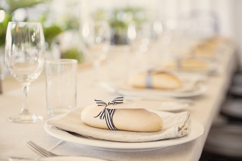 table place setting with baguette, photo by Studio Impressions