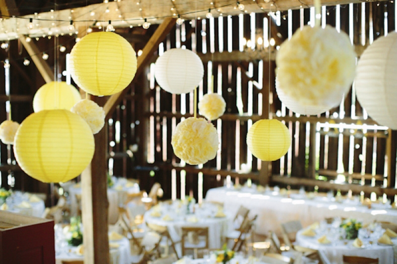 yellow and white lanterns in barn wedding reception, photo by Dan Stewart Photography