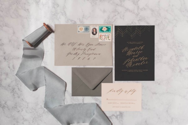 white, silver, and black wedding invitations