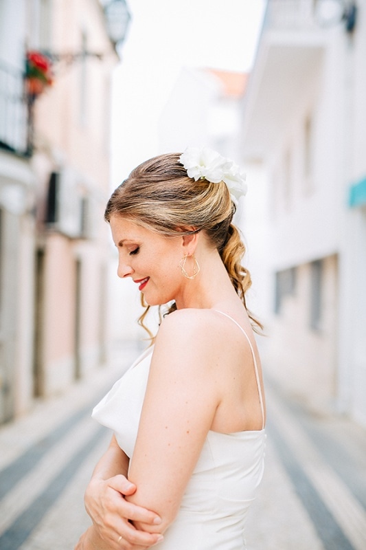 bridal updo with white flowers