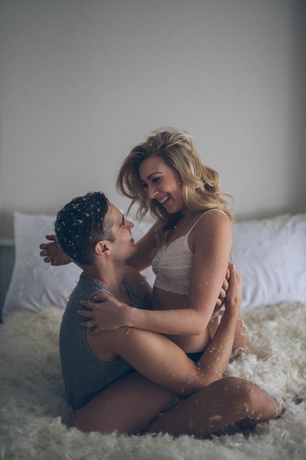 Sexy Pillow Fight Couple Boudoir by Nicole Ashley Photography