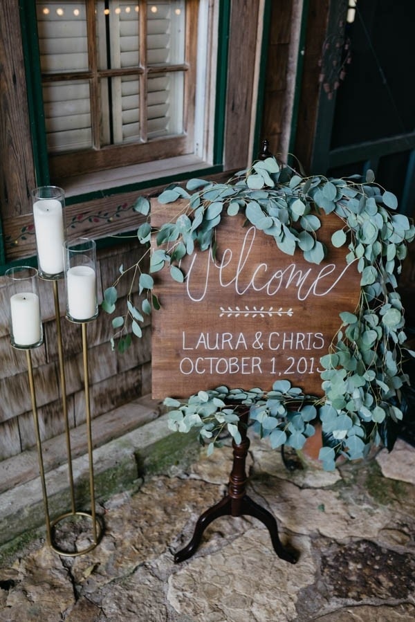 Elegant Rustic Magnolia Leaf Wedding Welcome Sign and Hurricane Candle Display