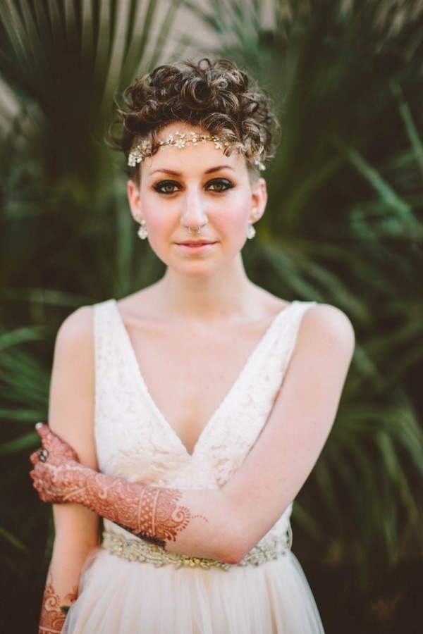 Bohemian Bridal Style with Elegant Lace Dress, Mehndi Body Art, and Crystal Headband