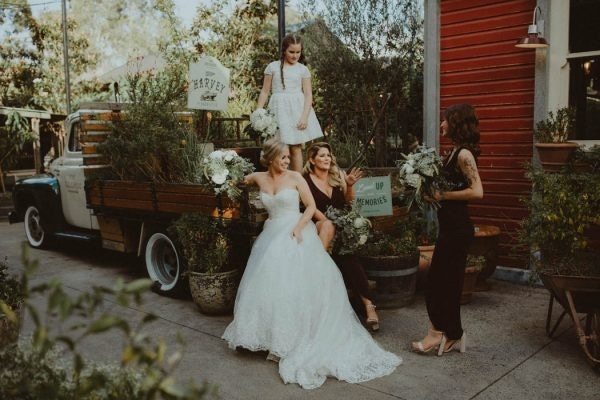 The Bride and Her Bridesmaids on the Back of a Truck