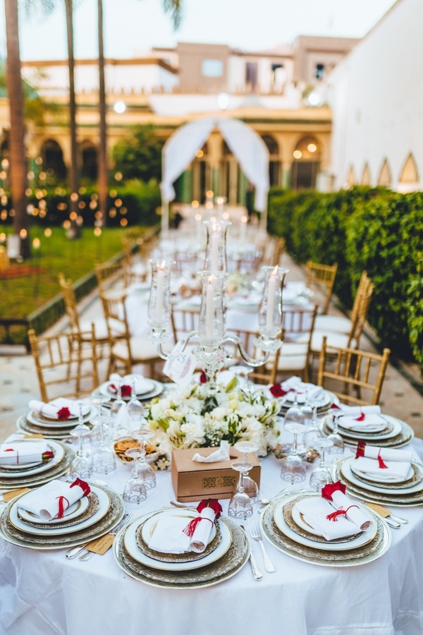 Elegant Outdoor Reception Decor with White Linen and Candlesticks